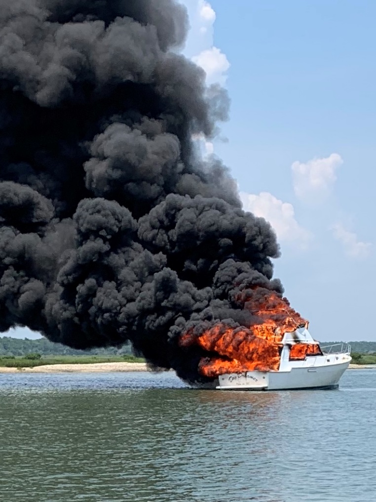 The recreational boat Daydreamer, on fire in the Intracoastal Waterway after the people aboard abandoned ship and were rescued.